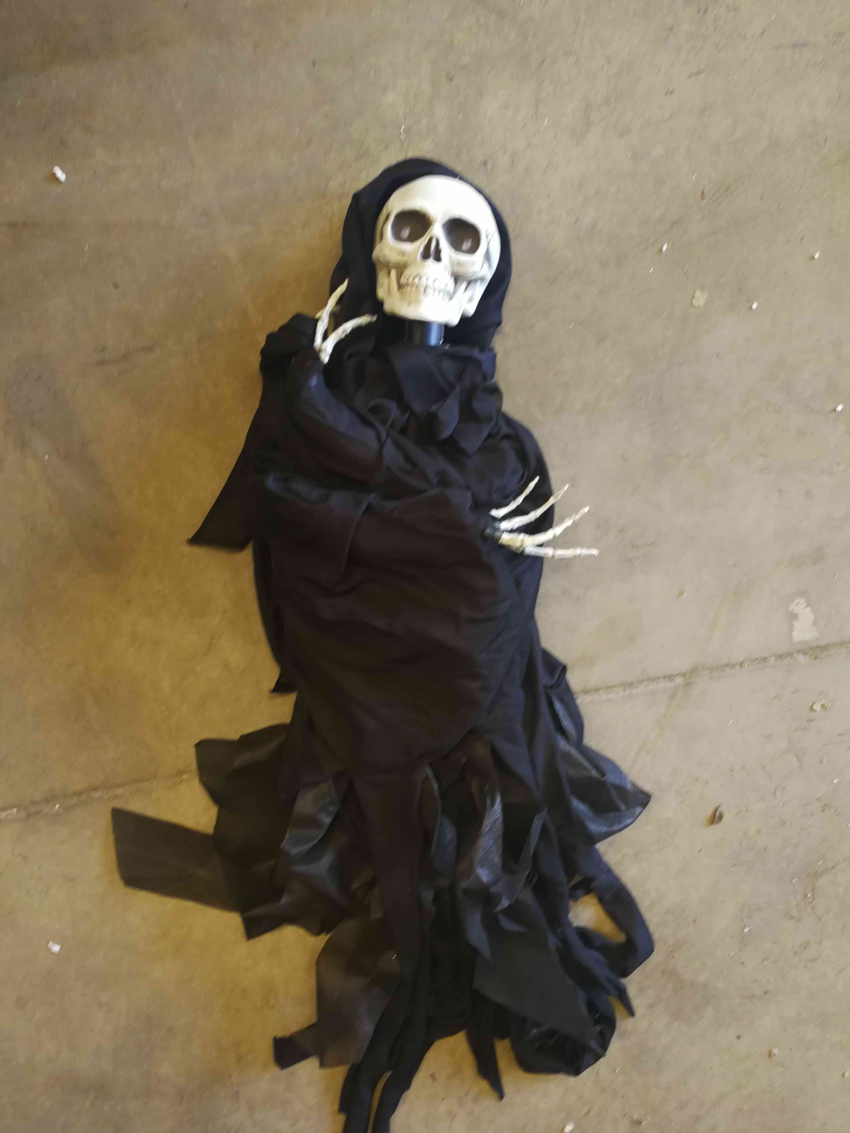 black cape skull