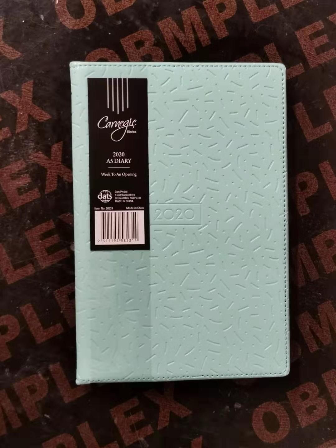 58531, Diary WTO A5 Embossed 4 Asstd Cols / 2 D