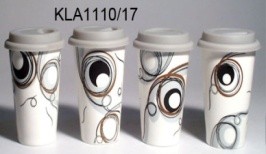 $5,MUG WITH SILION COVER 17 OZ